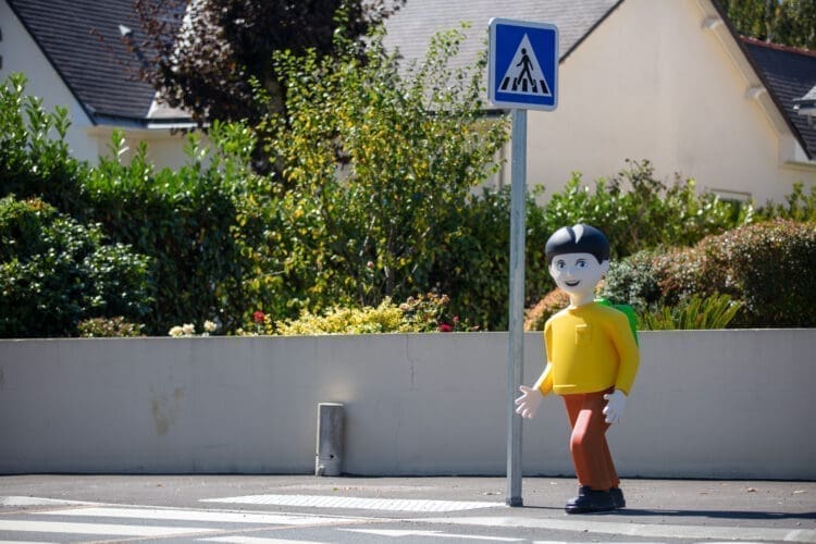 Elan City - Signakid - Luke, the child like bollard installed near pedestrian crossings in an American city - US
